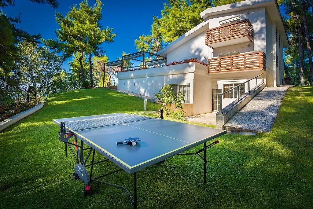 Апартаменты The White Villa At Sani Сани-Бич